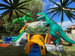 3d20dinosaur20castle20behind20trees20 20resized 1718659835 3D Dino Roar Combo Jumping Castle